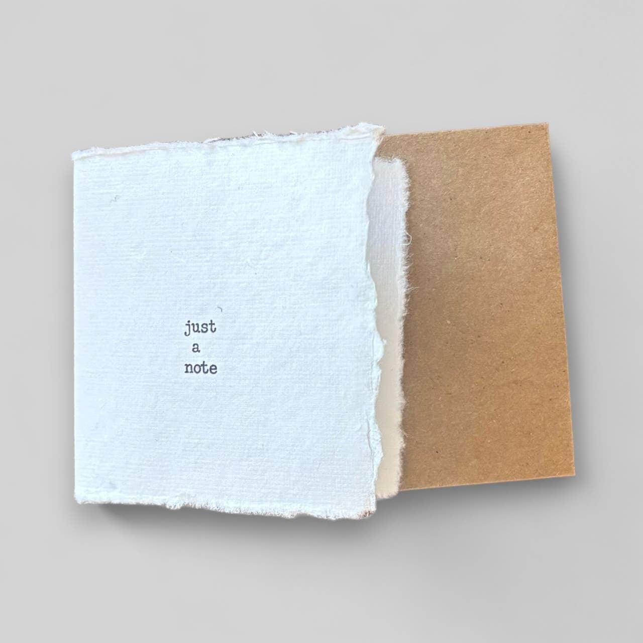 Small white handmade typewritten just a note card - Songbird Gifts